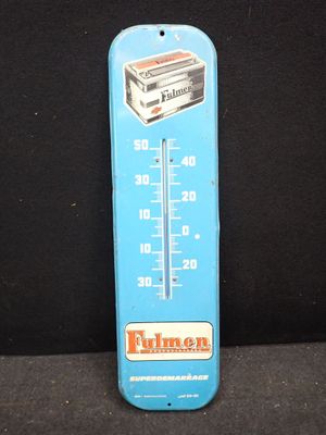 une image représentant un thermomètre bleu sur fond noir