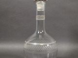 an image of a glass decanter with a diamond on the top