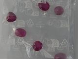 a plastic bag filled with red and white candies