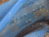 a close up view of a rusted metal pipe