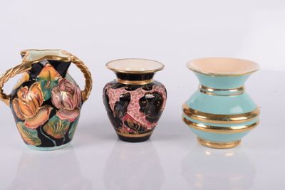 three vases sitting next to each other on a table