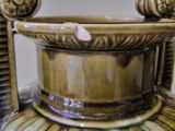 a vase that is sitting on a table in a room