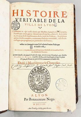 a book with a picture of a coat of arms on it