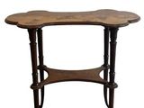 an image of a wooden table with a flower shaped top
