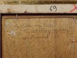 a close up of a wooden door with writing on it