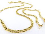 a close up of a gold chain necklace on a white background