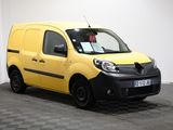 the yellow van is parked in a large room with a checkered floor