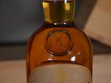 a bottle of whiskey sitting on a table