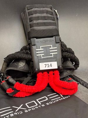 a black backpack with a red rope attached to it