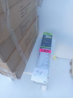 a cardboard box and a box of leds on the floor