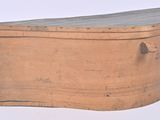 an old wooden box with a lid on a white background