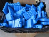 a box full of blue legos sitting on a table