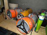 a shelf that has a bunch of cans and cans on it