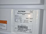 a close up of a white refrigerator with a label on it