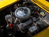 a close up of a car ' s engine with the hood open