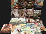 un grand nombre de livres posés sur une table