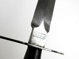 a knife that has been cut in half with a sharp blade