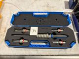 a blue case with tools in it on a table