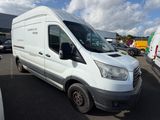 a white van that is parked in a parking lot