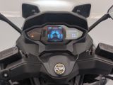 a close up of a motorcycle with a digital display on it