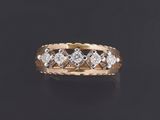 a gold and diamond ring