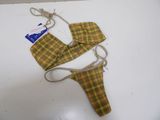 plaid swimsuit with tie on the side and a tag attached to it