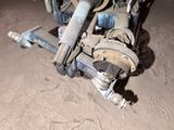 a motorcycle that is sitting on the ground in the dirt
