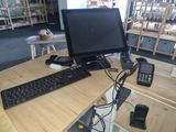 an image of a computer desk with a keyboard and a monitor