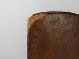 an old book sitting on top of a wooden table