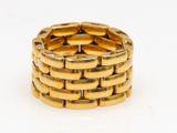 an image of a close up of a gold ring on a white surface