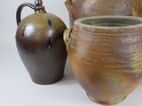 three vases sitting next to each other on a table