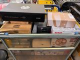 many boxes and boxes on a cart in a store