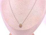 yellow sapphire and diamond pendant on a mannequin necklace