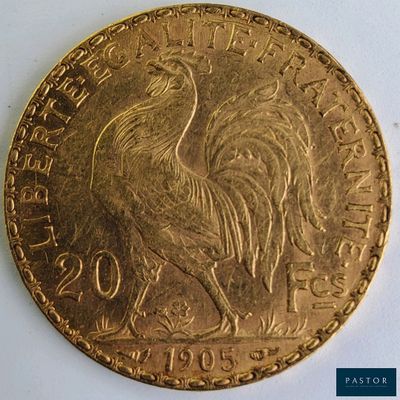 l'image d'une pièce d'or ornée d'un coq