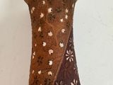 a vase that is sitting on a table in a room