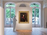 a large painting on display in a large room