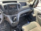 a dashboard of a car with a steering wheel and dashboard controls