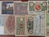 several different types of paper money laid out on a table
