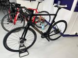 two bikes that are sitting on the floor in a room