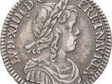 a close up of a coin with a woman ' s head on it