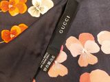 an image of a close up of a floral print shirt