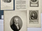 several old photographs of men and women are on display