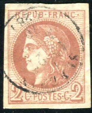 a stamp with an image of a woman wearing a headdress