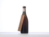 a bottle of wine that is sitting on a table