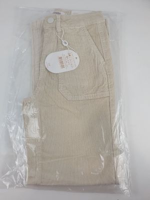 the back of a pair of beige pants with a tag on it