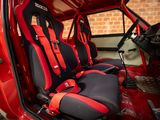 two seats in the back of a red car
