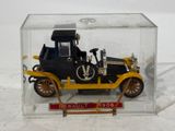 a small model of a car in a clear box