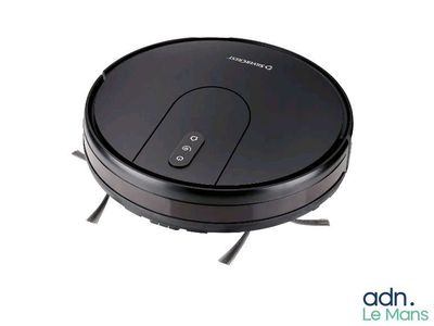 gros plan d'un aspirateur robotisé sur une surface blanche