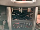a car dashboard with a dash panel and various gauges