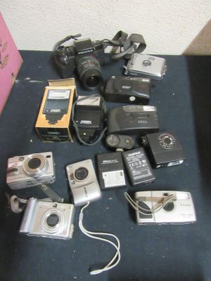a lot of electronic devices that are on the table